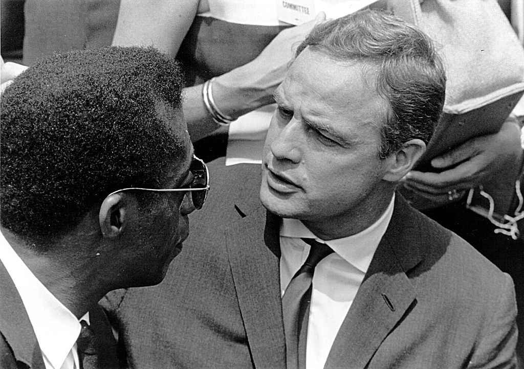 James Baldwin with Marlon Brando during the March on Washington, August 1963. (<a href="http://www.gettyimages.com/license/1445248">Hulton Archive</a>/Getty Images)
